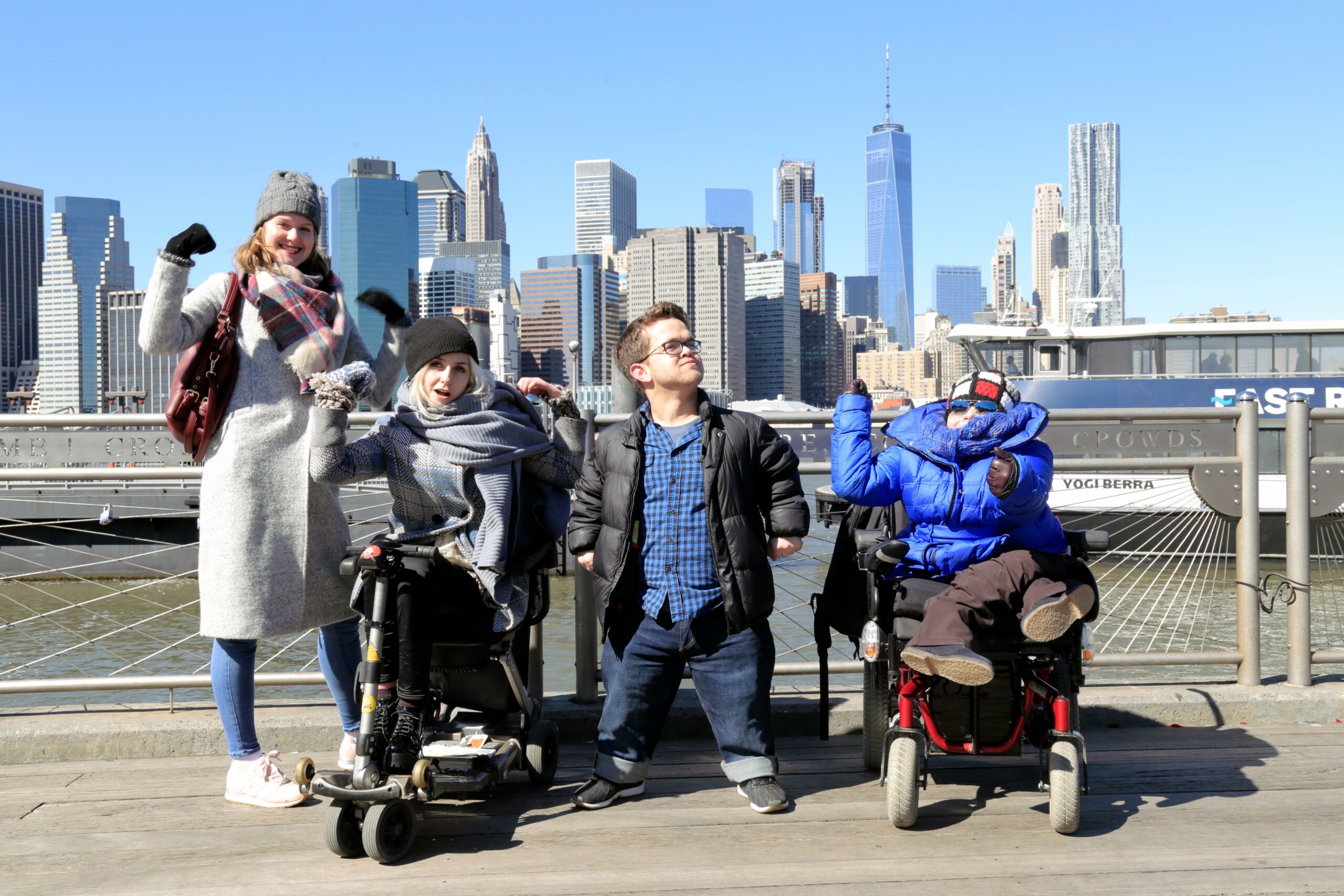 EE program participants Vera Shamaeva, Maria Gendeleva, Jonathan Novick, and Veronika Ivanova (left to right) pose in front of the New York City skyline