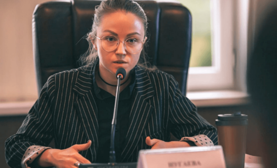 Woman speaking at a conference