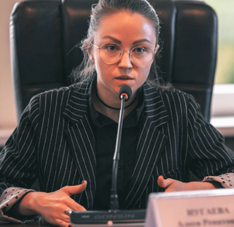 Female speaking at a conference