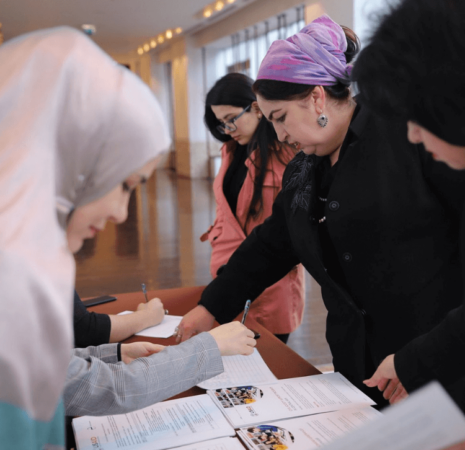 Women looking at brochures