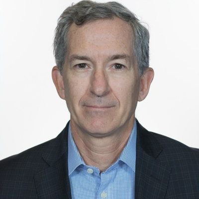 Eric Green looks to the camera in front of a white backdrop.