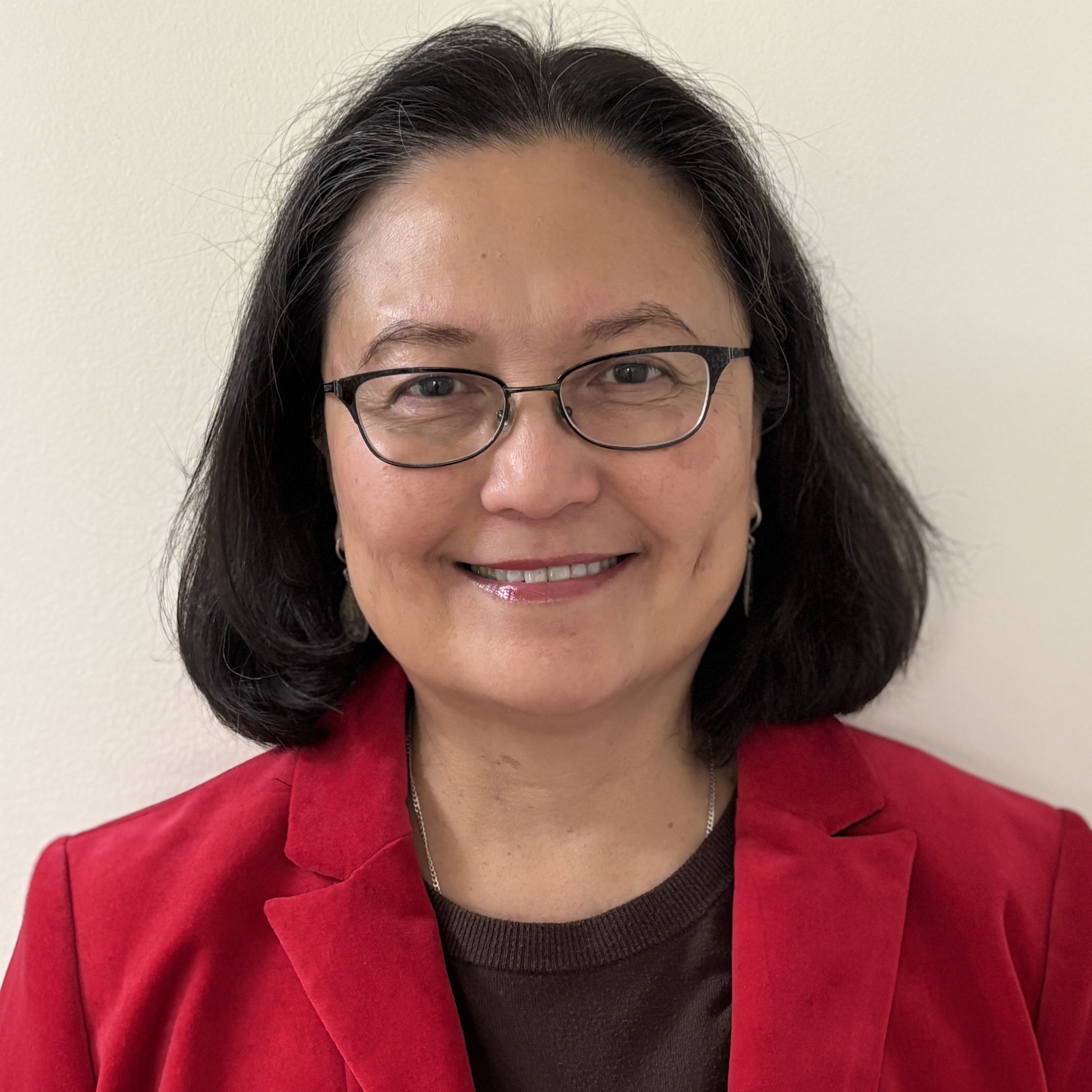 A headshot of Lisa Magno.